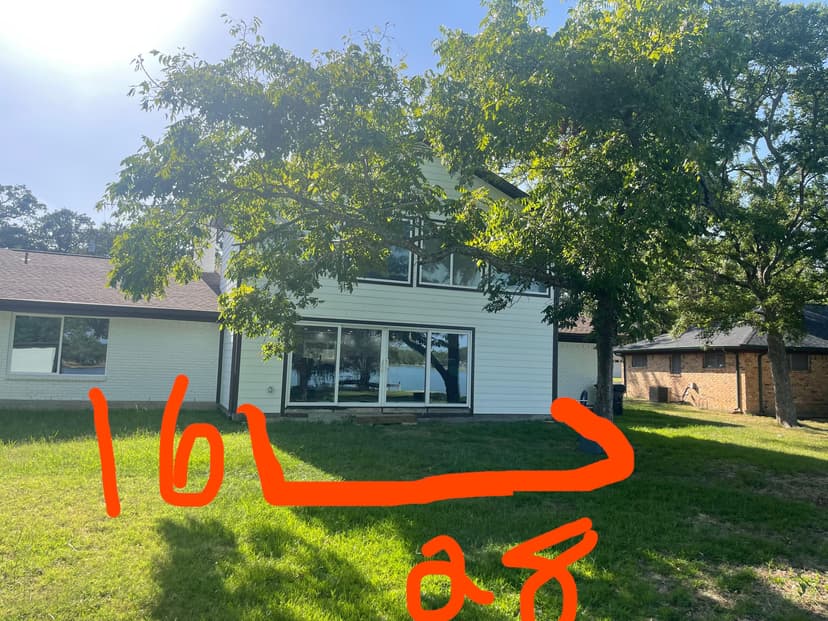 install a 28ft x 16ft floating pressure-treated deck wrapping around a tree