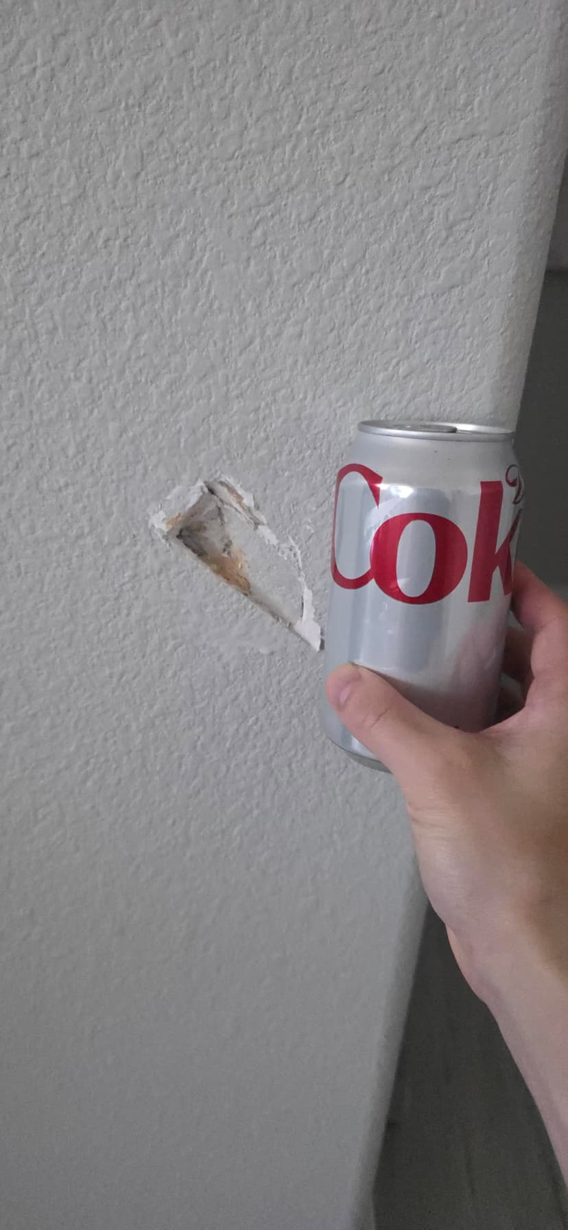 repair a small drywall hole